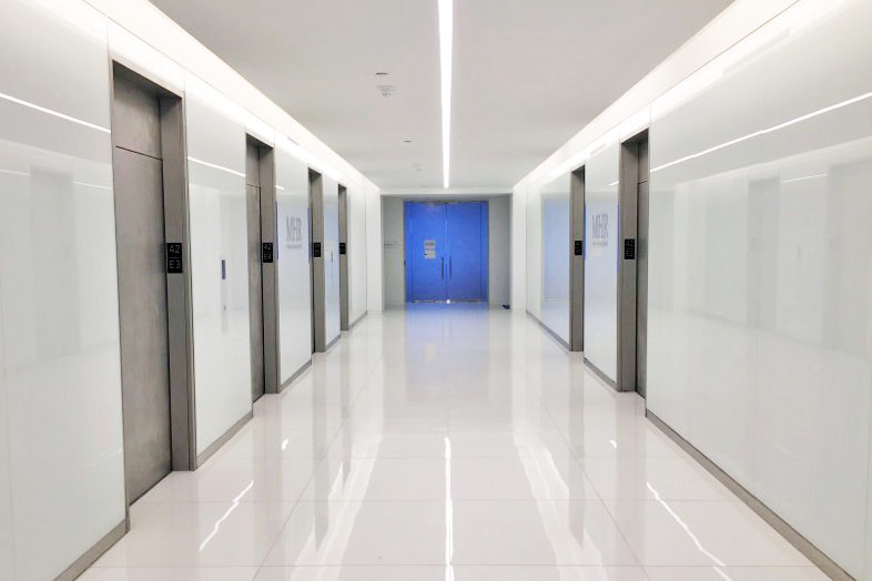 Painted Stainless Steel Elevator Door Portals + Doors + Back Painted Glass.MHR Fund Management – 1345 Avenue Of The Americas – New York, NYArchitect: Spector Group
