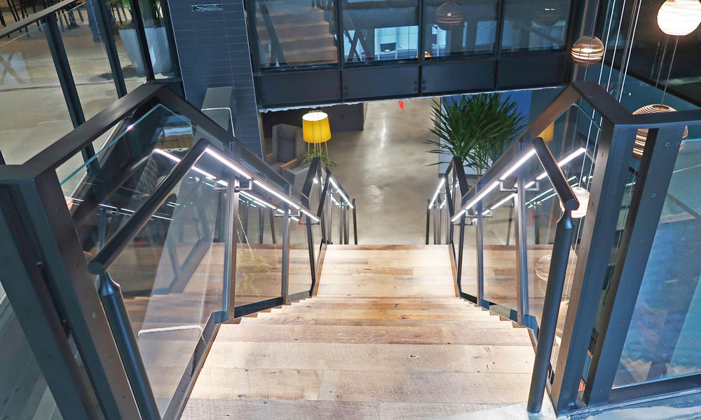 Blackened Steel + Glass Guardrails With Integrated Lighting.